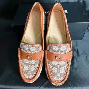 Coach Woman’s  Tan and Brown Loafers- shoes used once 9B